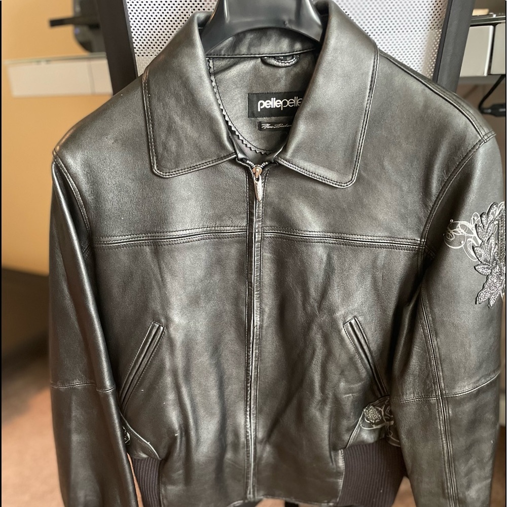 Like new Women’s Pelle Pelle leather coat.